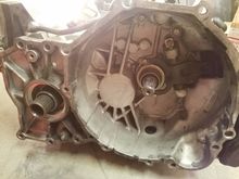 Trans mission side.  Input shaft is lightly lubed with ACT clutch grease 