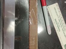 making a cardboard cut-out that will be the same shape as the aluminum