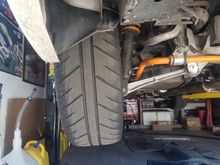 Took a pic to demonstrate the size difference between OEM 235 and the 305. I LOLed. 