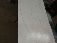This is the basement paneling with the shape of the original factory shield traced onto it with a pen