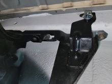 cut the bracket, leaving just one 'hook'. the hole will need to be adjusted to match the hole already on the car's frame. the bolt is 1/2" 3" long