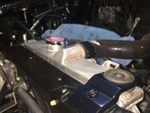 Radiator bracket and hose clamps done in misty midnight