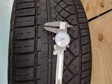 Tread depth measured in middle of tire