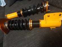 Shocks. Yellow color have been replaced to red, same that valve cover.