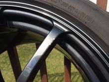 chips on spoke, passenger rear
