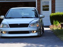 Ok so you guys know what I want the sides and back of the car to look like(mostly stock) and this is what I want the fron to look like(mostly stock also) with the acception of the custom fog lights(wow they look perfect right there!) And also with the acception of the aggressive lowered look. Now personally this is too low for me, but yep this and the previous pic perfectly show the near future of my ES. With the big differences in color though. Mines will be all black :) including the rims.