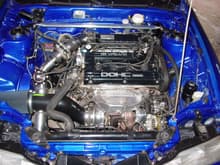 blue car engine bay