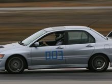 Trail braking at speed.