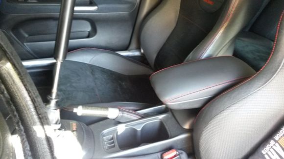 This is an Evo VII Center console in my USDM Evo IX. They had never made one before.  It fits perfectly, no issues at all! I sent them the original to copy from. They matched my SE, red stitched interior too!