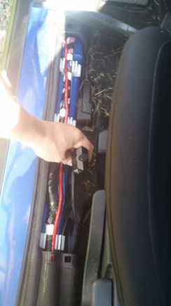 found the speaker wire colors and traced them back through the door and into the drivers side tower. The i cut the lines and the heads off my RCA line and just connected the two. Used a 1hz signal to confirm the polarization was right.