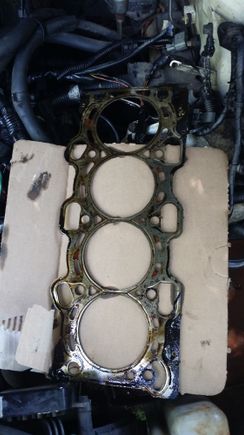 This is the old head gasket, I could not find any specific faults, but the whole gasket looks fried and defected and could have a fault anywhere