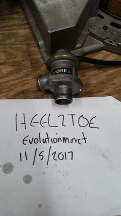 WORKS IX Metal Diverter Valve. This is based off the IX valve but has been modified to their specs and is supposed to hold over 30PSI. I cant get it to hold over 27PSI without it cracking open. With that being said it works fine just and is pretty much inline with a stock IX valve if not very slight additional holding power. $100