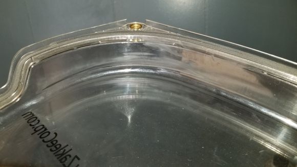 Scuff on inside of cam cover from belt.