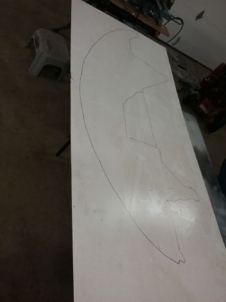 This is the basement paneling with the shape of the original factory shield traced onto it with a pen