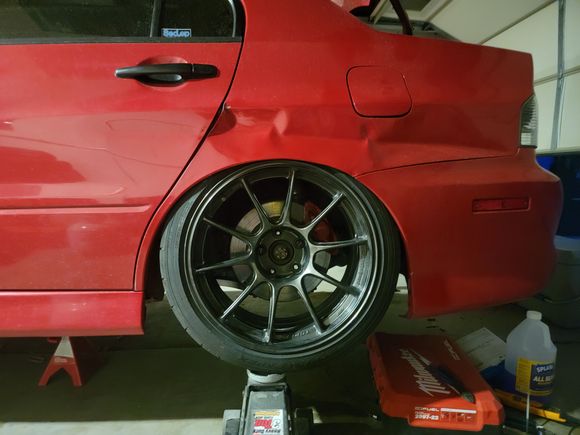 18x10 +20 with a 265/35 

The dent was from a hit n run 