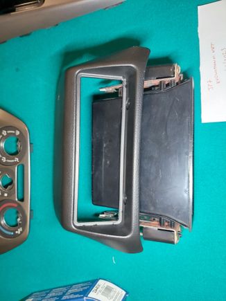 Lower radio bezel single din size with single din pocket - asking $60