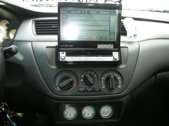 Clarion DVD Deck and OEM Mitsubishi Evo Gauges