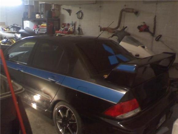 Installed a new Mitsubishi Logo on the back window this winter in my garage.