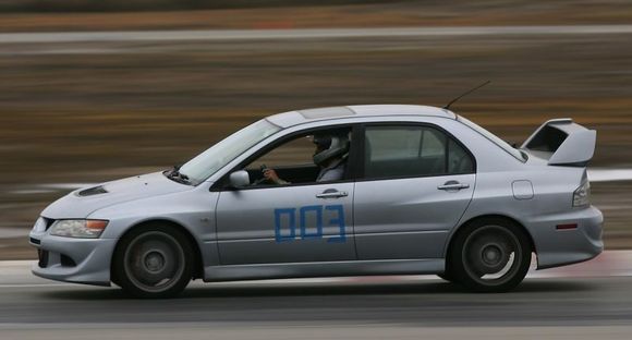 Trail braking at speed.