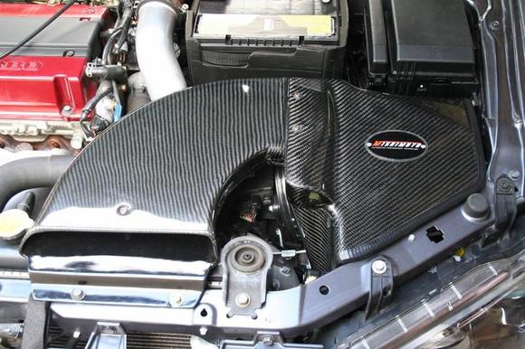 Mishimoto carbon intake installed. No modification for it.