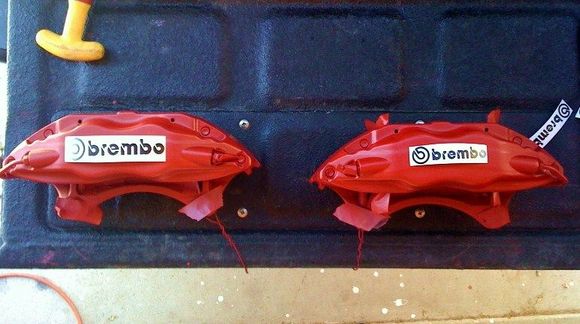 The stock 3.25" logo on right and 4.25" logo on left.