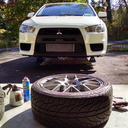The blue can is NAPA rubberized undercoat and the bottle next to it is the bead blaster.