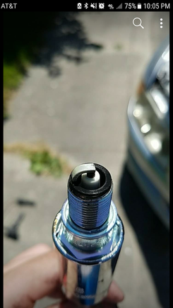 This is what the spark plugs looked like when i pulled them to check compression. The old ones, which were iridium, had a dark tan color, and looked normal. These look like the car is running lean