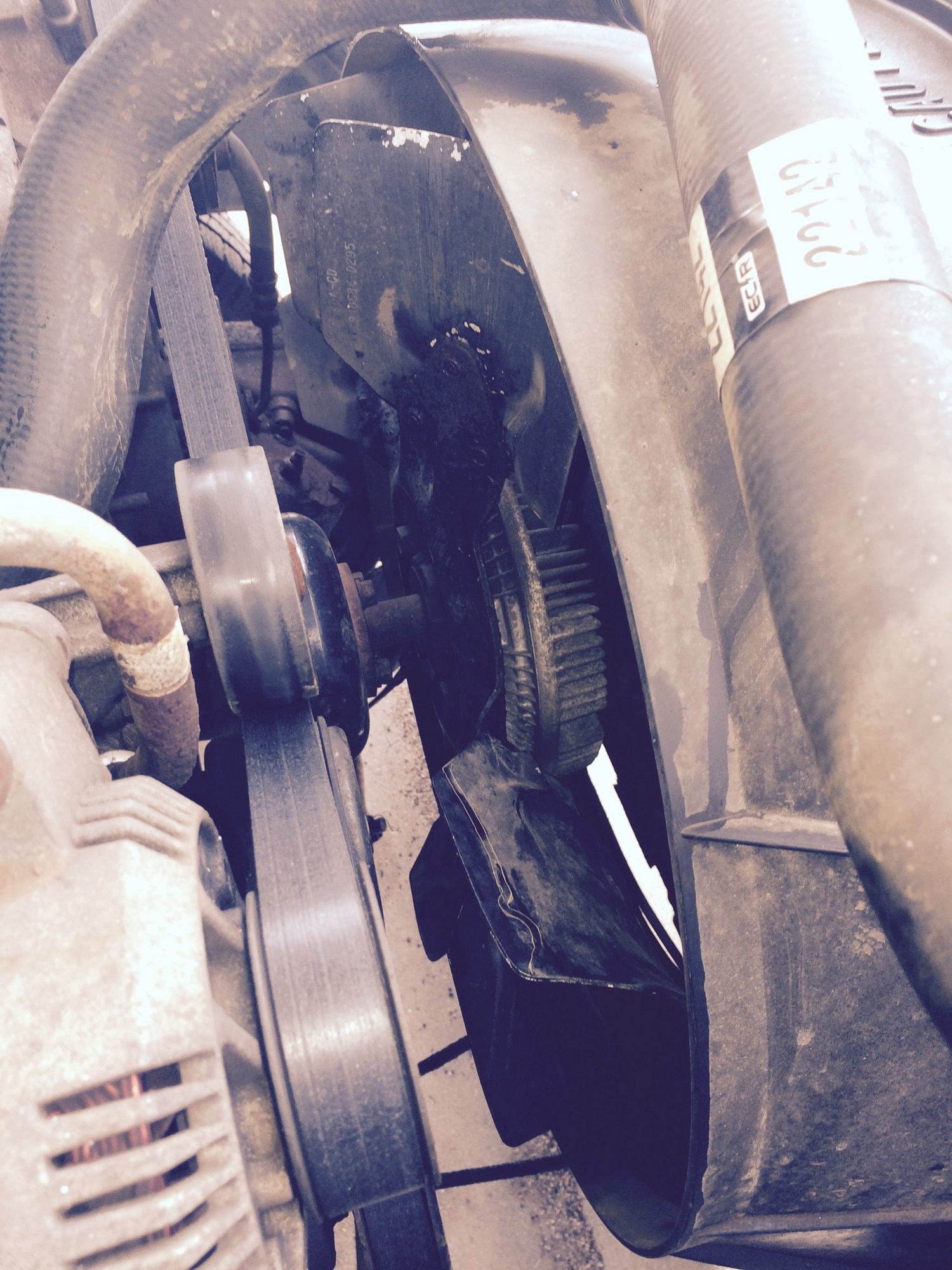 Radiator Fan Cutting Through Upper Hose Please Help... Ford F150