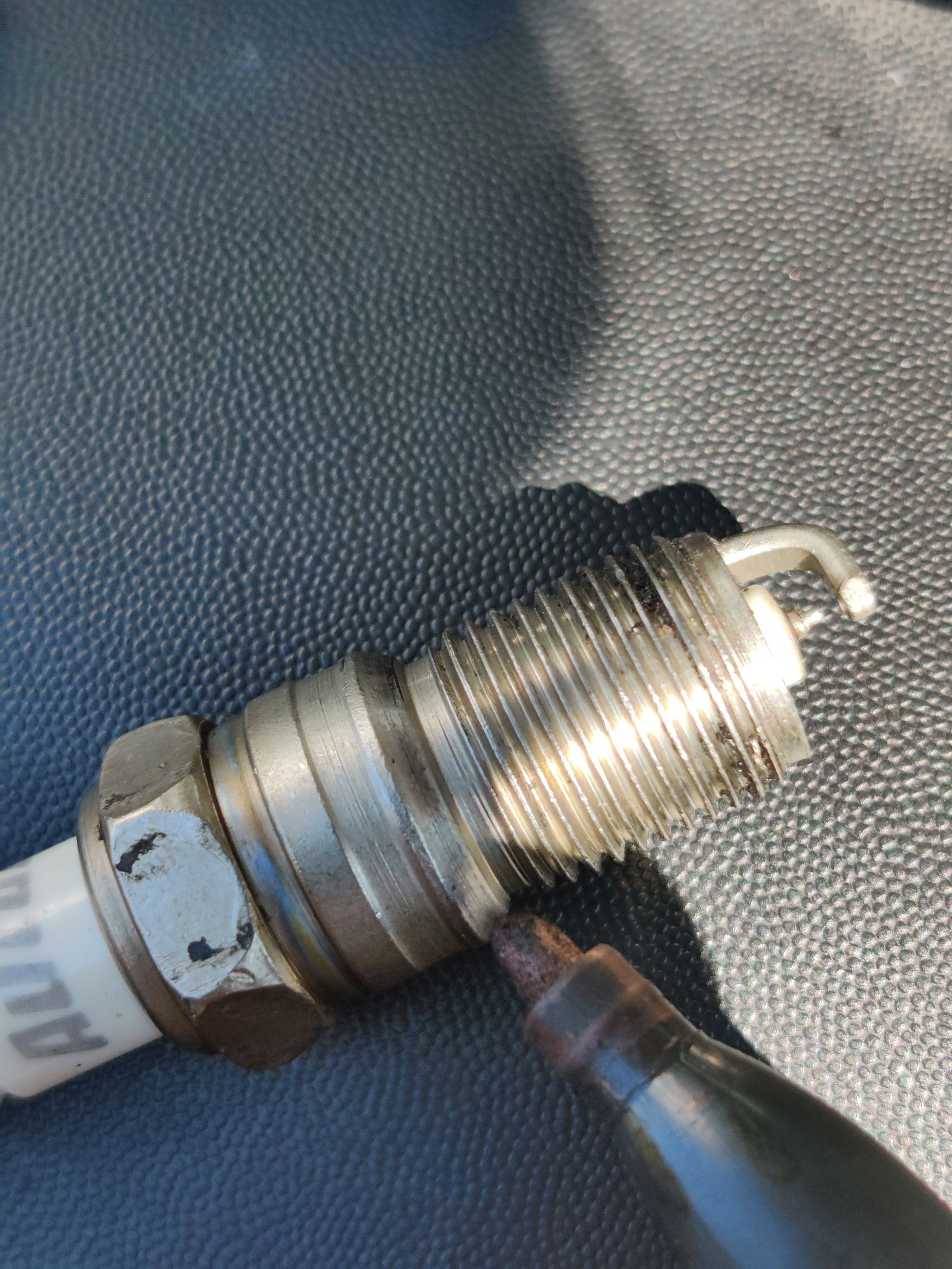 2000 F150 Cylinder 4 Spark plug wont thread in Help please (photos