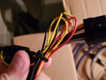 The black yellow and red wires are looped. My guess was this is a power/ground/remote bundle, and if so where do they go to?