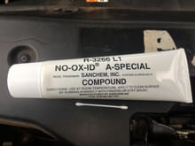 Electrical grease - NOT to be confused with Dielectric Grease.  Use this for battery terminal connections and where the alternator bolts up to the engine.  For Motorcraft junkies - Look up Motorcraft XG12