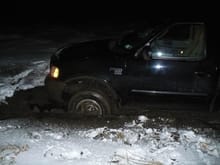 The night I got my truck stuck in the field way out back behind my house.