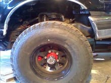 Undercoated frame hubs calipers painted red and new rims and tires