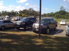 My truck on the left next to guy at church