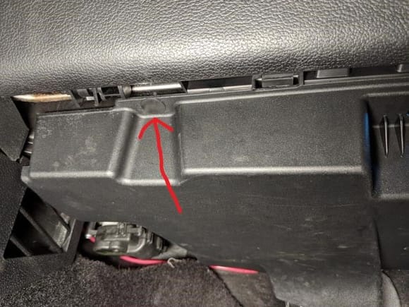 Plastic Panel under the glove box - pull out the plastic pin to remove