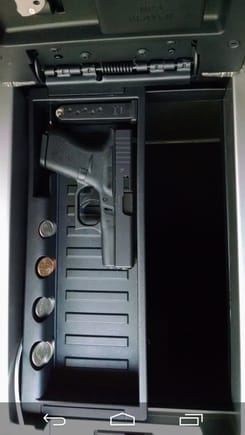 This is from my previous gen, but the tray in the 2015 is the same. Its a Glock 42.