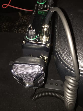Microphone clip attached to the side.