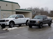 The 2014 F150 beside the 2009 Ranger it replaced