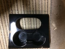 Center console cup holder. Came out of an 07 Harley. Again light scratches nothing is broken. No rubber inserts. 
45 shipped??? Let me know. I can provide more pics on both items!