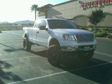 second lift. procomp stage 2. coilovers cranked with 2" a/leaf. overall 8 inch lift.