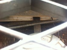 Driver upper bracket through grille