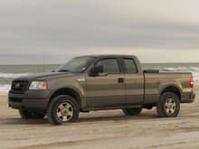 The F150 on the beach.  It was an extremely overcast day and my truck looked different colors throughout the day.