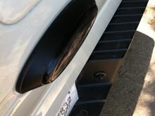Tailgate badge riser plate