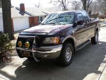 2002 F150 King Ranch.  Another old pic, with the KC DayLighters on the push bar.