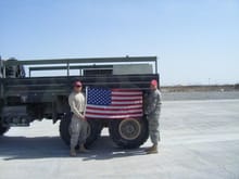 Me and one of my guys with a flag we flew