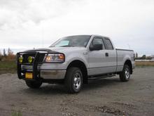 'Fefay' the Ford - getting closer to how I want her.
Added the Moose-Catcher, Mud-flaps, Black Stripe on the lower panels, Hood Bug Deflector, Window Rain Deflectors, Tonnue cover, Tail Light Guards, LED Cargo/3rd Brake Light, LED Tail/Brake/Turn Light Strip w/ override switch, Bed Liner, 2in Baja Clevis, and full interior floor covers to catch mud &amp; snow. A pair of 'Light Force' Moose Lights linked to the Hi Beam-Low Beam switch. 
Recently added a 'Thrush' brand SIDO exhaust with 2.5" / 14 gage pipes exiting on both sides, making a very nice low tone. An 'AIRAID' CAI and Throttle Spacer are in the garage, waiting install. 
Still on the stock 255s and basic OEM 17in rims.
Coming soon are 265s DC Mtn Cats (as soon as I get get to them), maybe some nicer rims, and some LED Bed-Lights to see under the tonnue when I need to.