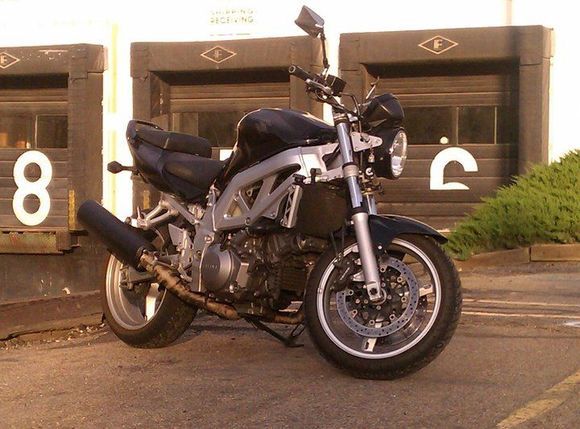 Body's work's painted.  Pipes are wrapped.  Stay tuned for pics of the GSXR front end swap.