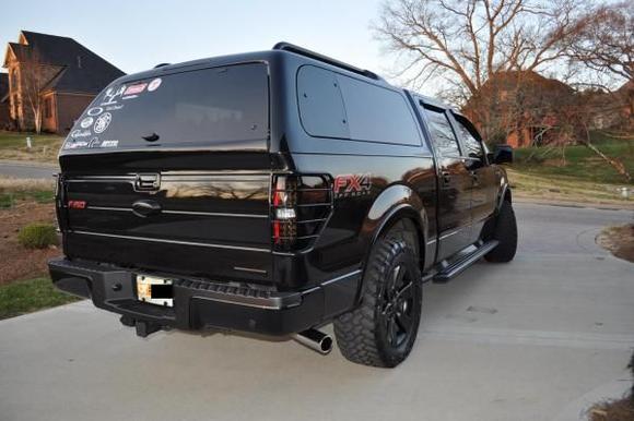 New tall lights w/ custom paint and grille covers.
Sugtop shell with coustom paint on bars.