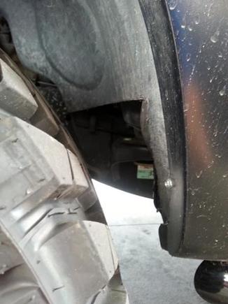 This is how much I had to cut out behind the front tires.