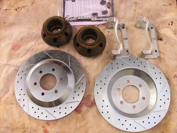 Baer Eradispeed Kit comes with new hubs for 2WD and that's why it costs more.